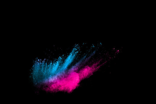 abstract color powder explosion on  black background.abstract color powder splatted on black background. Freeze motion of color powder exploding.