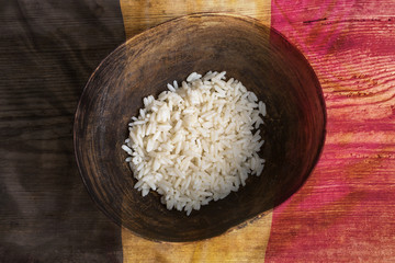 Poverty concept, bowl of rice with Belgium flag