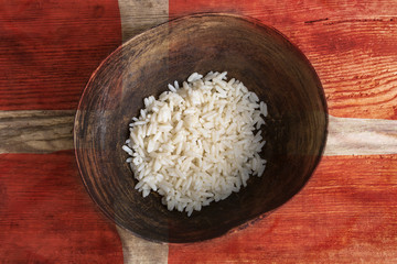 Poverty concept, bowl of rice with Denmark flag
