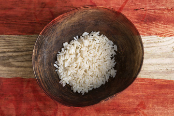 Poverty concept, bowl of rice with Austria flag