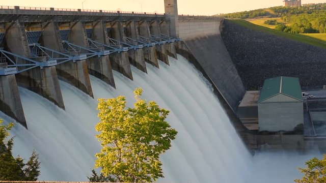 Dam releasing a large amount of water like a large waterfall