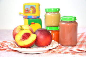 baby food, baby mashed in a glass jar, peach