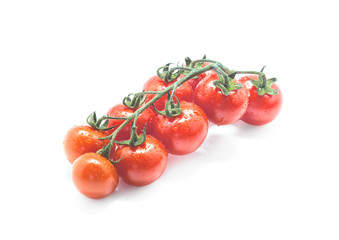 Bunch of fresh cherry tomatol on white background.