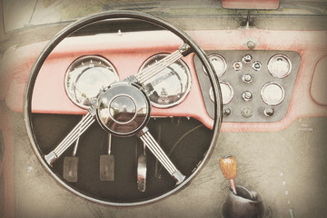 Steering wheel and dashboard in vintage car, illustration