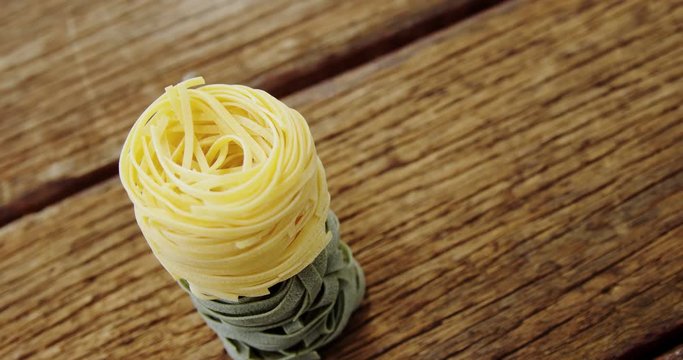 Close-up of green and yellow fettuccine