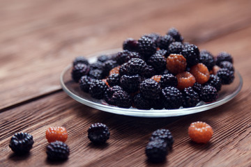 Berries on wooden background