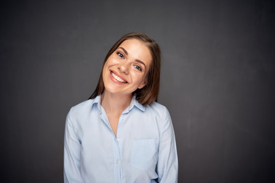 Young business woman smiling with teeth.