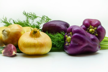 Assortment of fresh raw vegetables on white background. Selection includes potato, green onion, pepper, garlic and dill