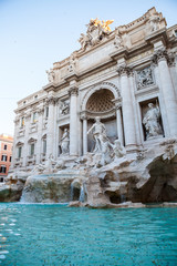 Fototapeta na wymiar Trevi fountain, Rome, Italy. Rome facade architecture and landmark. Rome Trevi fountain is one of the main attractions of Rome and Italy. The tradition of throwing coins into fountain.Background