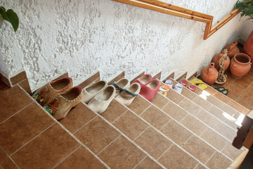 staircase with clay shoes