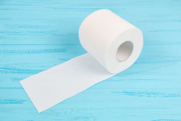 Roll of toilet paper on a blue background