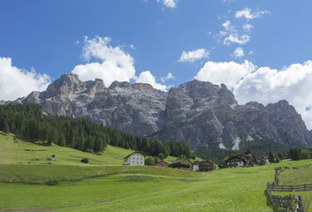 Fototapeta na wymiar Fantastic landscape on the Dolomites. View on Sas Crusc, and Lavarela picks. Alta Badia, Sud Tirol, Italy