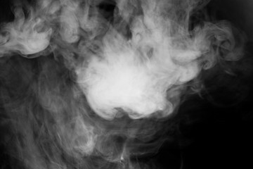 close up of steam smoke on black background.