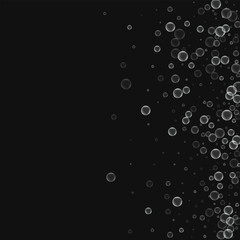 Soap bubbles. Scatter right gradient with soap bubbles on black background. Vector illustration.