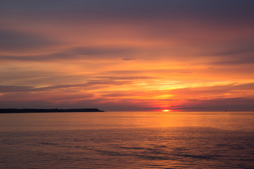 Naklejka na ściany i meble beautiful sunset sky over the baltic sea