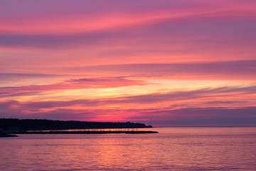 Naklejka na ściany i meble beautiful sunset sky over the baltic sea