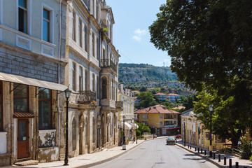 View of the street in balchik town, road and old historic houses in Bulgaria