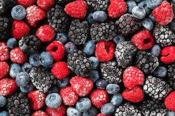 Assorted frozen berries background, top view © Sergey Chayko