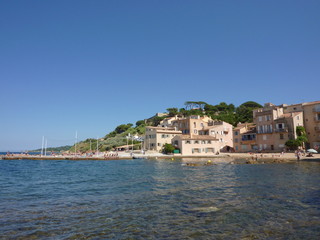 Fototapeta na wymiar Little beach and Sea in Saint Tropez Village Cote d'Azur French Riviera France