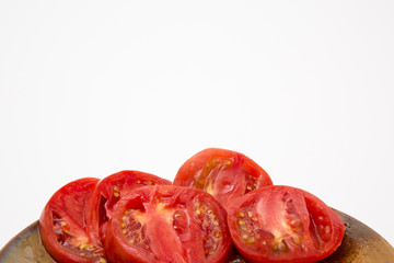 fresh sliced homegrown tomato tomatoes on plate