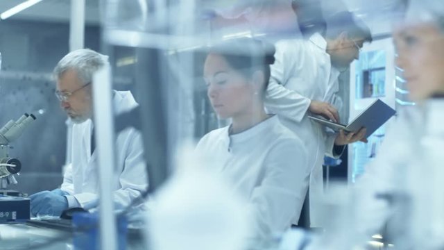 Following Shot of a Big Laboratory/ Medical Center Where Scientists Conduct Research/ Experiments. Shot on RED EPIC-W 8K Helium Cinema Camera.