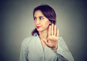 Angry woman giving talk to hand gesture