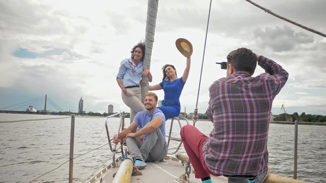 People during photo shoot on a yacht