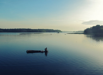 A fisherman in the Can Non lake.