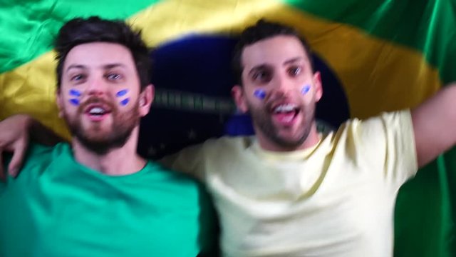 Brazilian Friends Celebrating with Brazil Flag