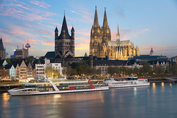 Aerial view Cologne over the Rhine River with cruise ship in Cologne, Germany. - obrazy, fototapety, plakaty