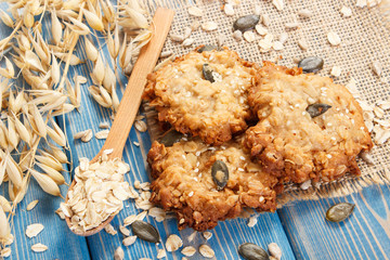 Oatmeal cookies and ingredients for baking, healthy dessert concept