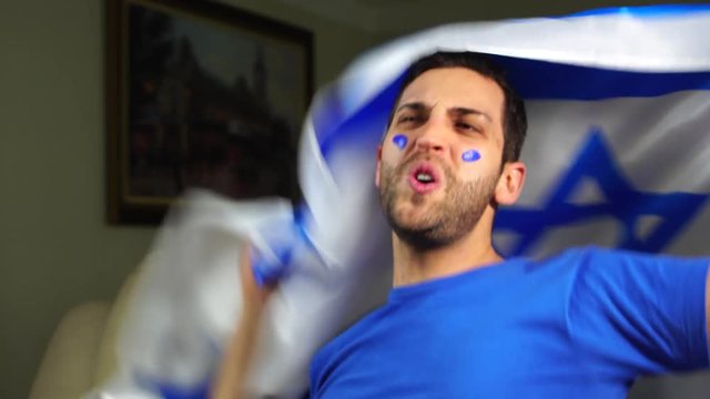Israeli Guy Celebrating with Israel Flag