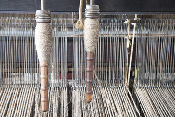 Yarn on loom in textile mill © karenfoleyphoto