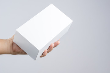 Hand holding blank white box give gift