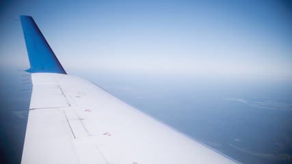 Fototapeta premium Wwing of the aircraft - the view from the window