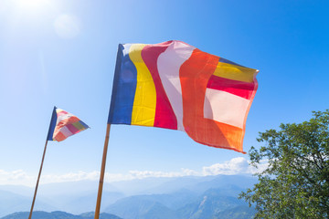 colourful flags waving in strong wind - sikkim, India