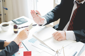 Client and lawyer have a sit down face to face meeting to discuss