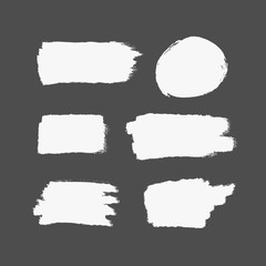 Texture of white brush strokes. Rectangular and round strokes. Set of isolated brushstrokes.