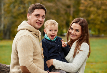 funny Little boy with parents