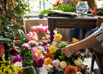 Flower shop business owner working service