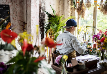 Flower shop business owner working service