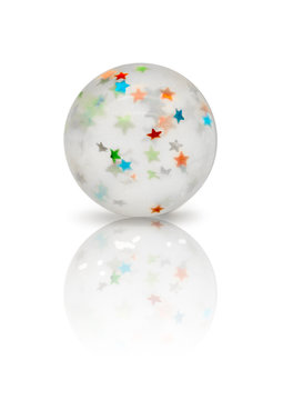 Transparent rubber ball with colorful stars inside isolated on white