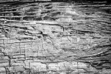 Pattern cracked old wooden background.