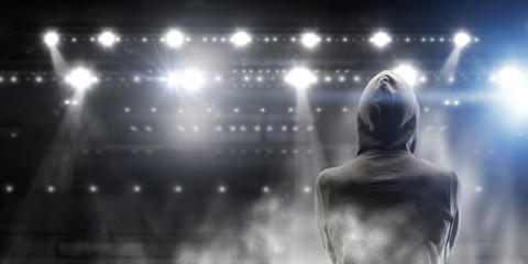 Fototapeta premium Silhouette of man in hoody