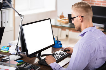 Fototapeta na wymiar Businessman Using Blank Computer