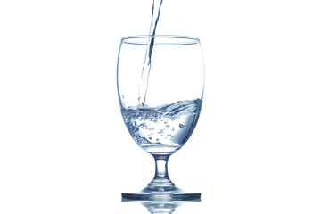 Pouring water into a glass isolated on white background with clipping path