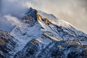 Fresh snow on a mountain peak in the Canadian Rockies, British Columbia, Canada
