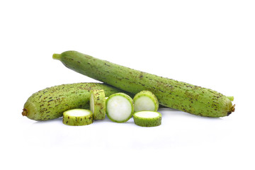 fresh green loofah or luffa with slice isolated on white background