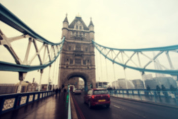Fototapeta na wymiar Blurred photo of London traffic at rush hour on Tower Bidge, London, UK