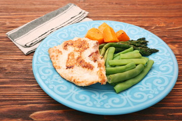 Roast turkey fillet with asparagus pumpkin and green beans